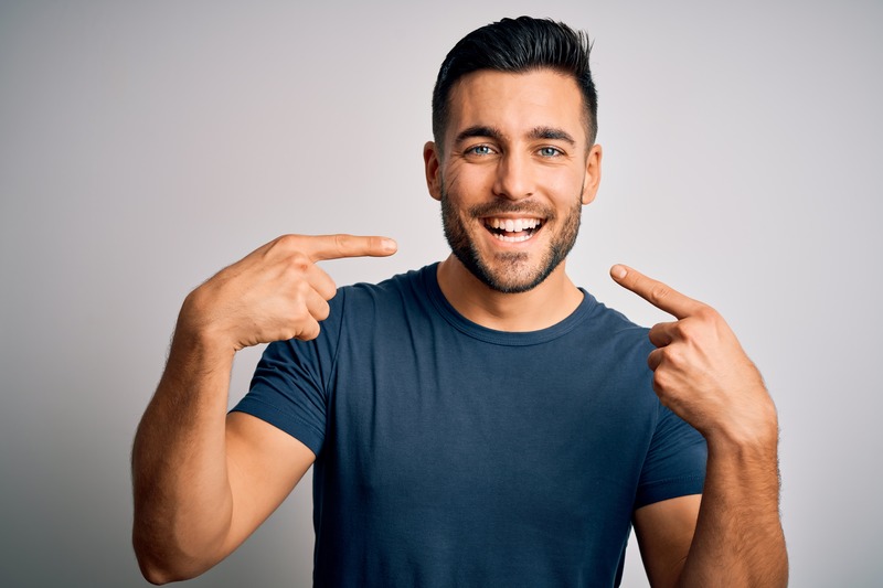 Patient smiling to show off their tooth enamel